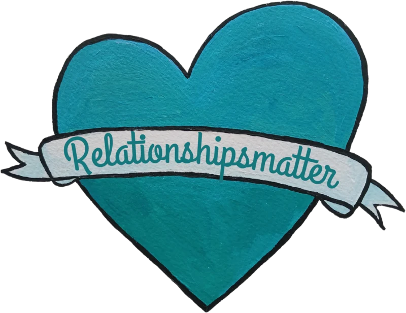 A painted heart carrying the RelationshipsMatter name on a banner